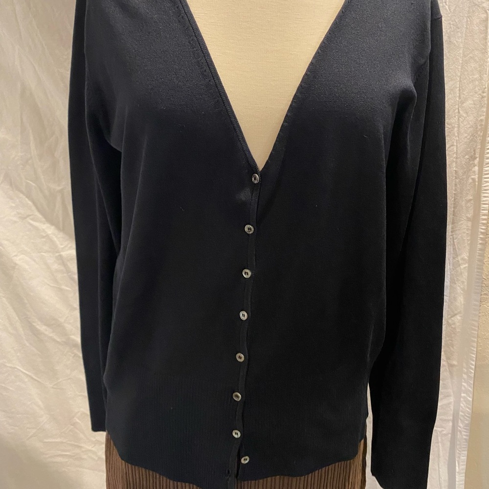 Harold’s black cardigan